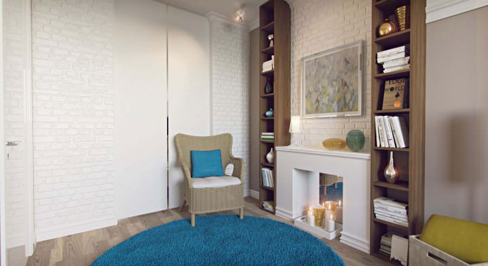 плетена столица и подигнути камин у унутрашњости дневне собе
