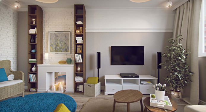 living room with a raised fireplace in a studio apartment of 43 square meters. m