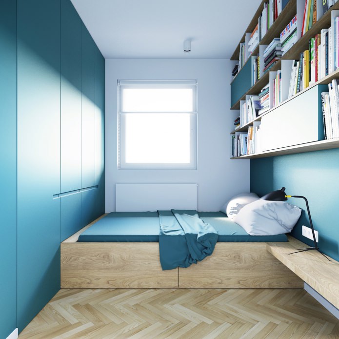 design af et soveværelse i turkise farver i en studiolejlighed