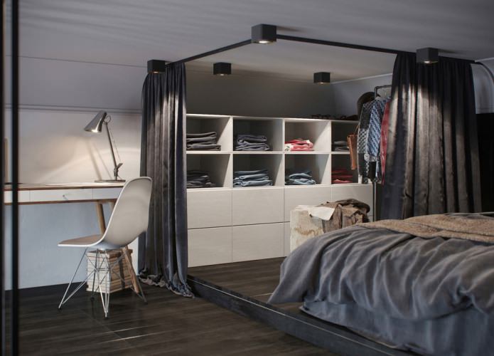interno camera da letto in un monolocale con soffitti alti