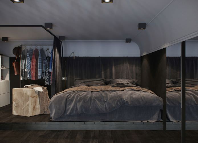 dormitori interior en un estudi amb sostres alts