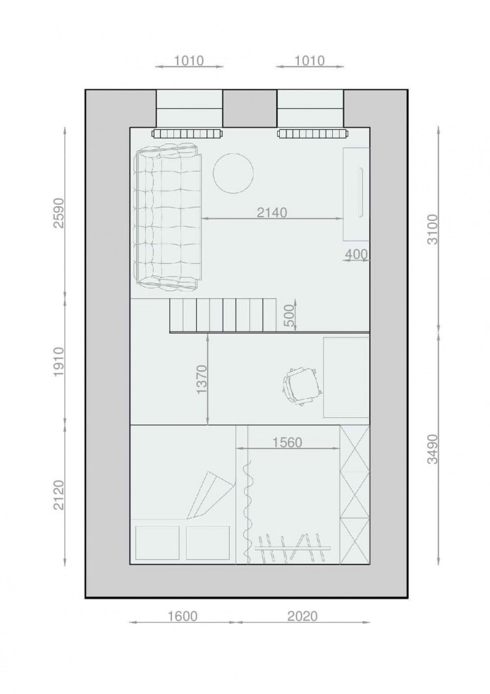 Layout af et to-etagers studio med højt til loftet
