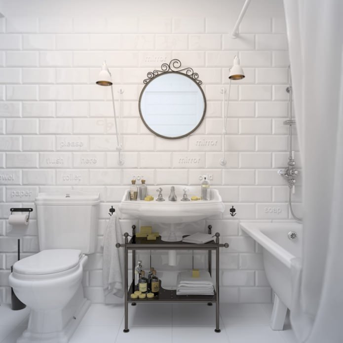 hvidt badeværelse med mursten