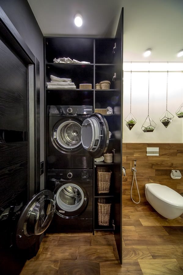 intérieur de salle de bain moderne avec laveuse et sécheuse