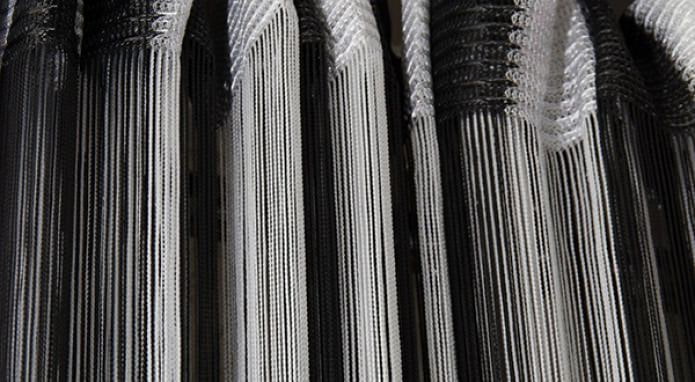 Two-tone black and white filament curtain