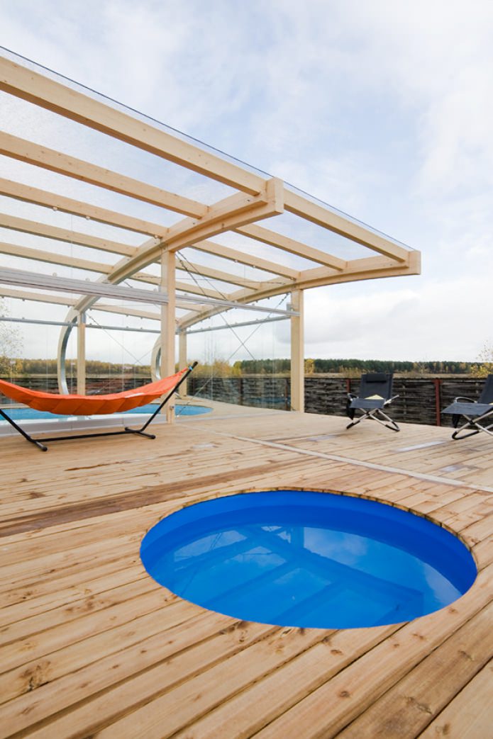 terrassa amb piscina i hamaca