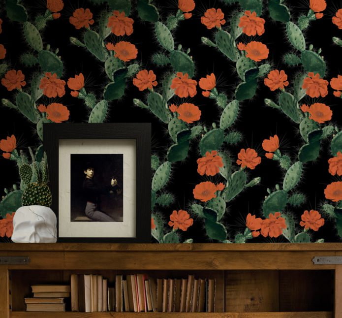 black wallpaper with green and red print
