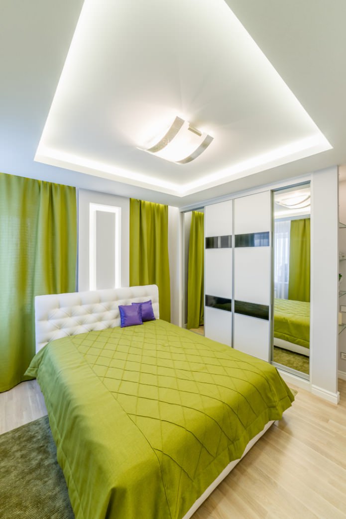 šviesiai žalios spalvos tekstilė miegamajame