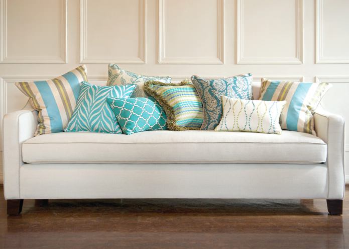 turquoise pillows on the sofa