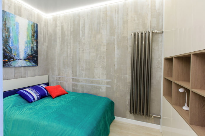 spavaća soba u potkrovlju sa sivim zidovima