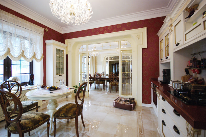 the walls in the kitchen are decorated with burgundy-gold wallpaper