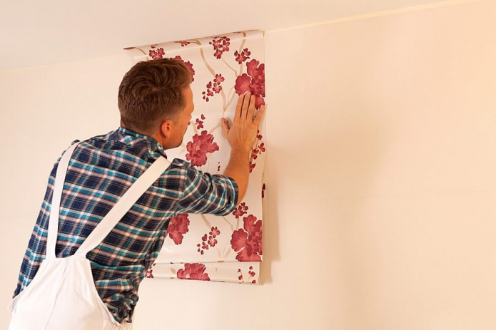 wallpapering on the walls