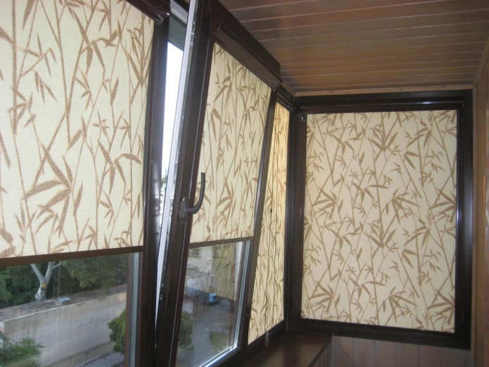 beige roller blinds with a loggia pattern