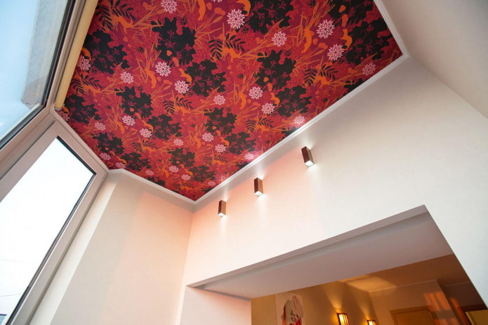 red floral wallpaper on the ceiling
