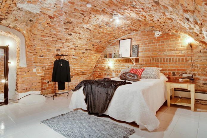 mursten loft i soveværelset interiør