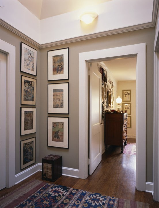 paintings in the corner in the hallway