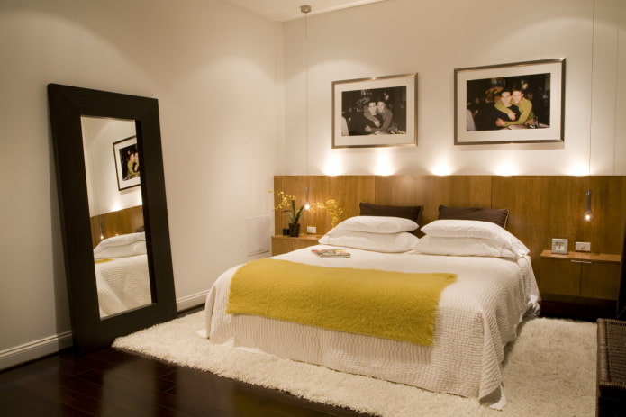 photos above the bed in the interior
