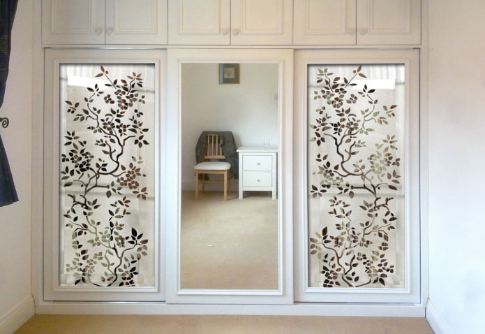 built-in mirrors with drawings in the interior