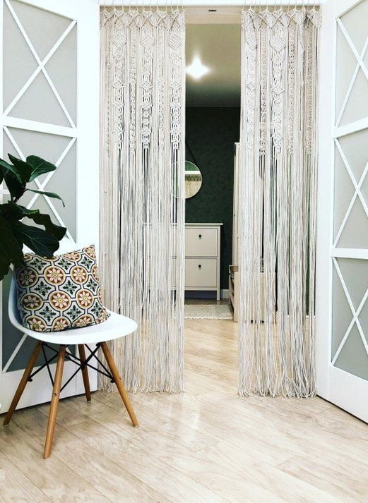 Macrame curtains on the door in the interior
