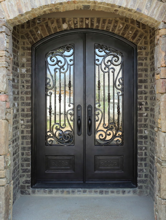 entrance door with forging and glass