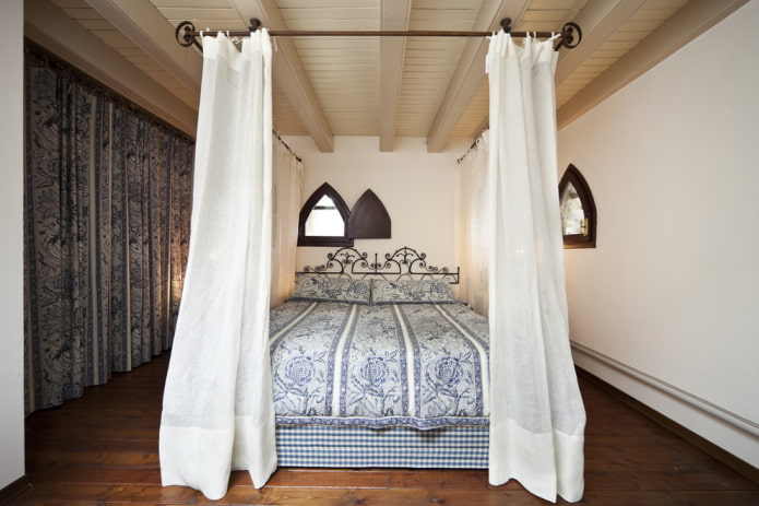 four-poster wrought iron bed