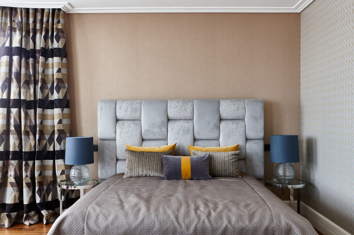 bed with a rectangular headboard in the interior