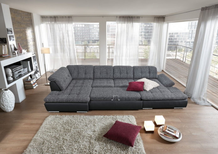 sammenleggbar sofa med en myk rygg i interiøret