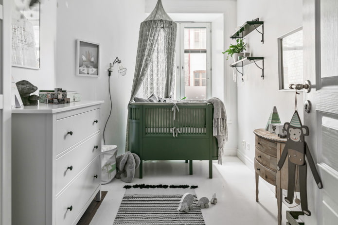 zöld ágy a csecsemő számára a belső térben