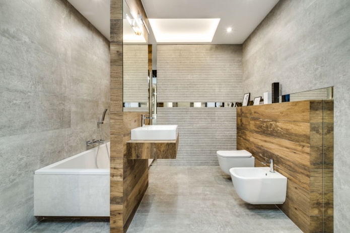 uma combinação de azulejos de madeira com concreto no banheiro