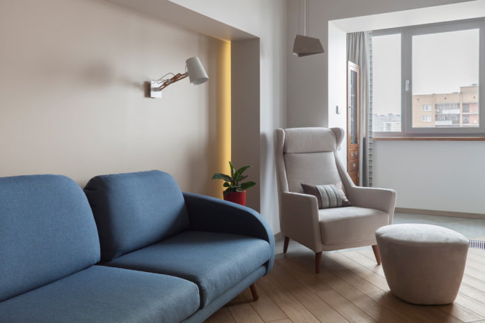 blaue Sofas kombiniert mit einem Sessel