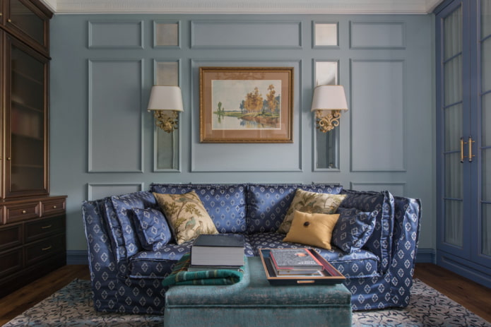 blå polstret sofa