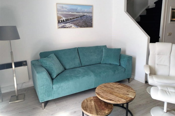 straight turquoise sofa in the interior