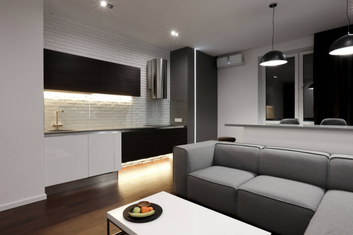 sofá no interior da cozinha no estilo do minimalismo