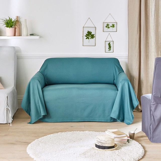 couvre-lit turquoise pour le canapé à l'intérieur