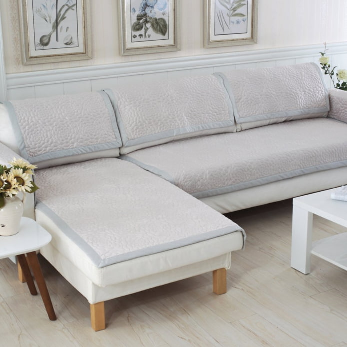 bedspread for an angular sofa in an interior