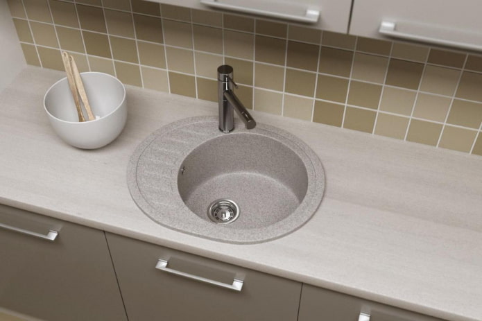 gray sink made of artificial stone in the interior