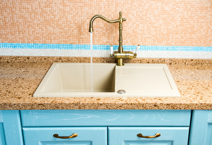artificial stone sink in the interior of the kitchen