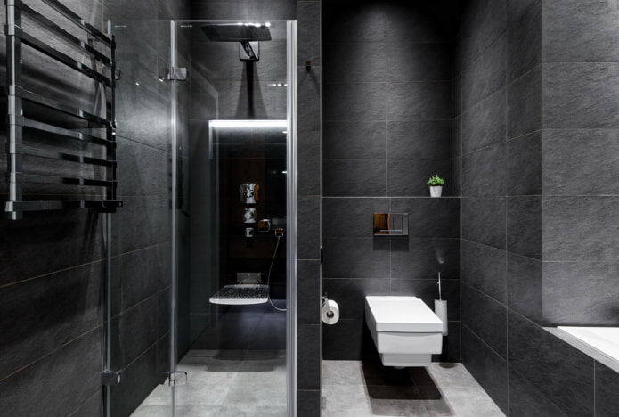 black tiles in the interior of the bathroom