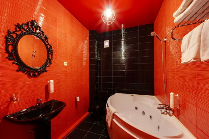 svart och rött badrum