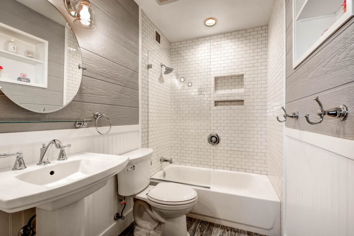 interior da casa de banho em tons de branco e cinza