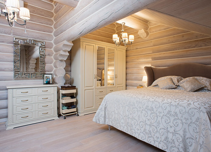 การออกแบบห้องนอนในการตกแต่งภายในของบ้านล็อก