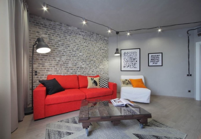 apgaismojuma dizains dzīvojamās istabas interjerā pilsētas stilā
