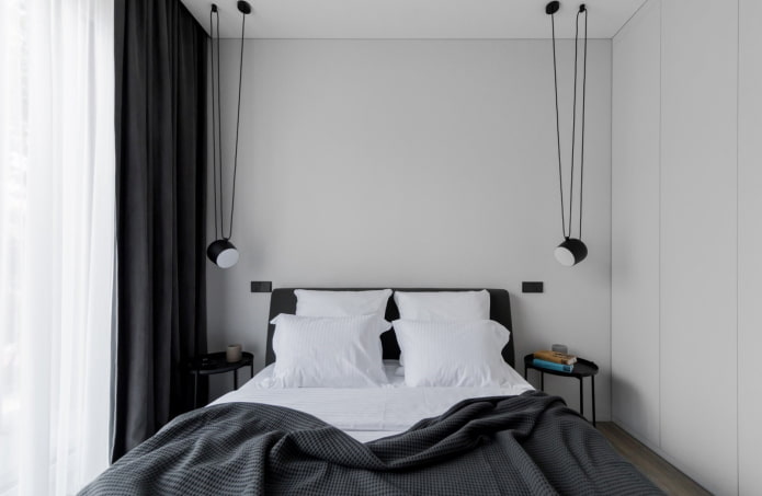 indretning og belysning af soveværelset i sort og hvidt