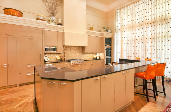 curtains in the interior of the kitchen in beige colors