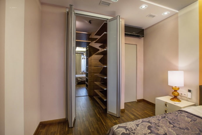 dressing room in a niche in the bedroom interior