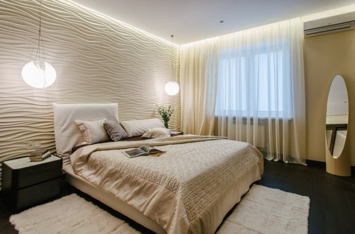indretning og belysning i det indre af et beige soveværelse