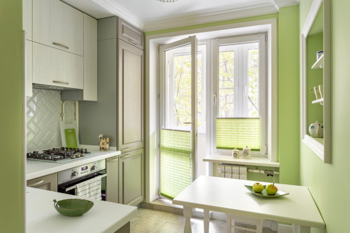 curtains in the interior of the kitchen in green colors