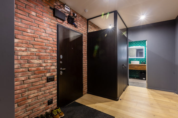 industrial style hallway with brick wall