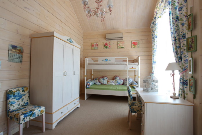 möbler i det inre av ett barns sovrum i stil med provence