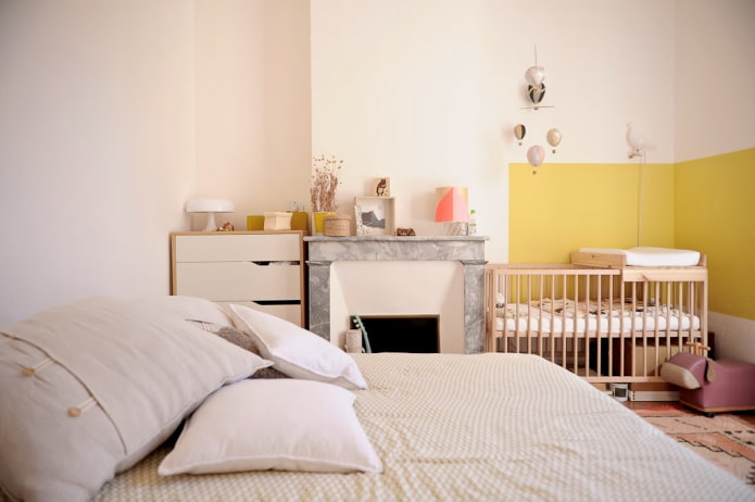 arrangement of furniture in the interior of the bedroom-nursery